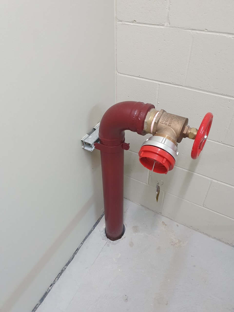 A recently cleaned and serviced fire hydrant in fire stairs