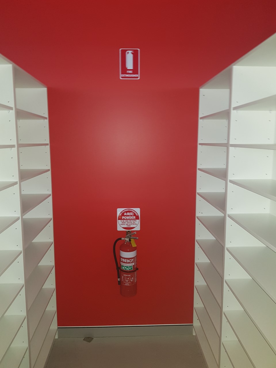 A serviced dry chemical powder fire extinguisher